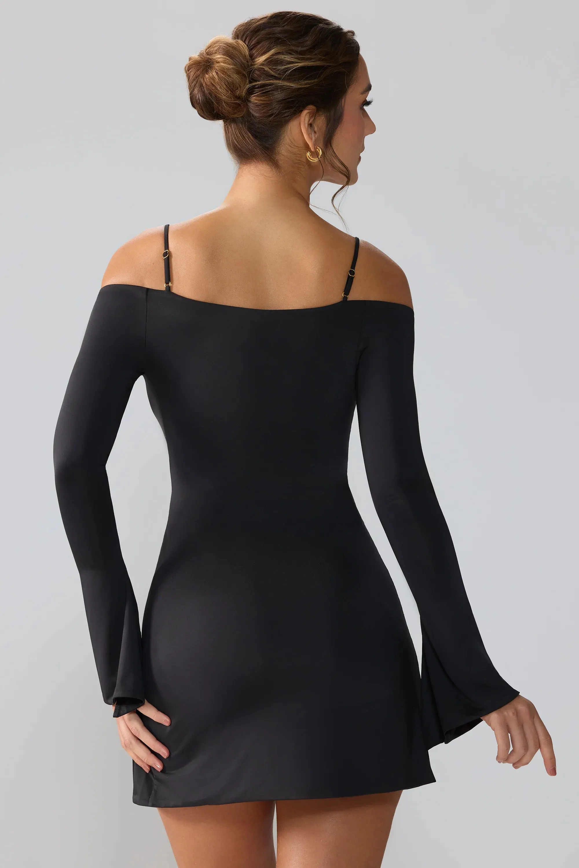 Slinky Jersey Long Sleeve Cut Out Mini Dress in Black