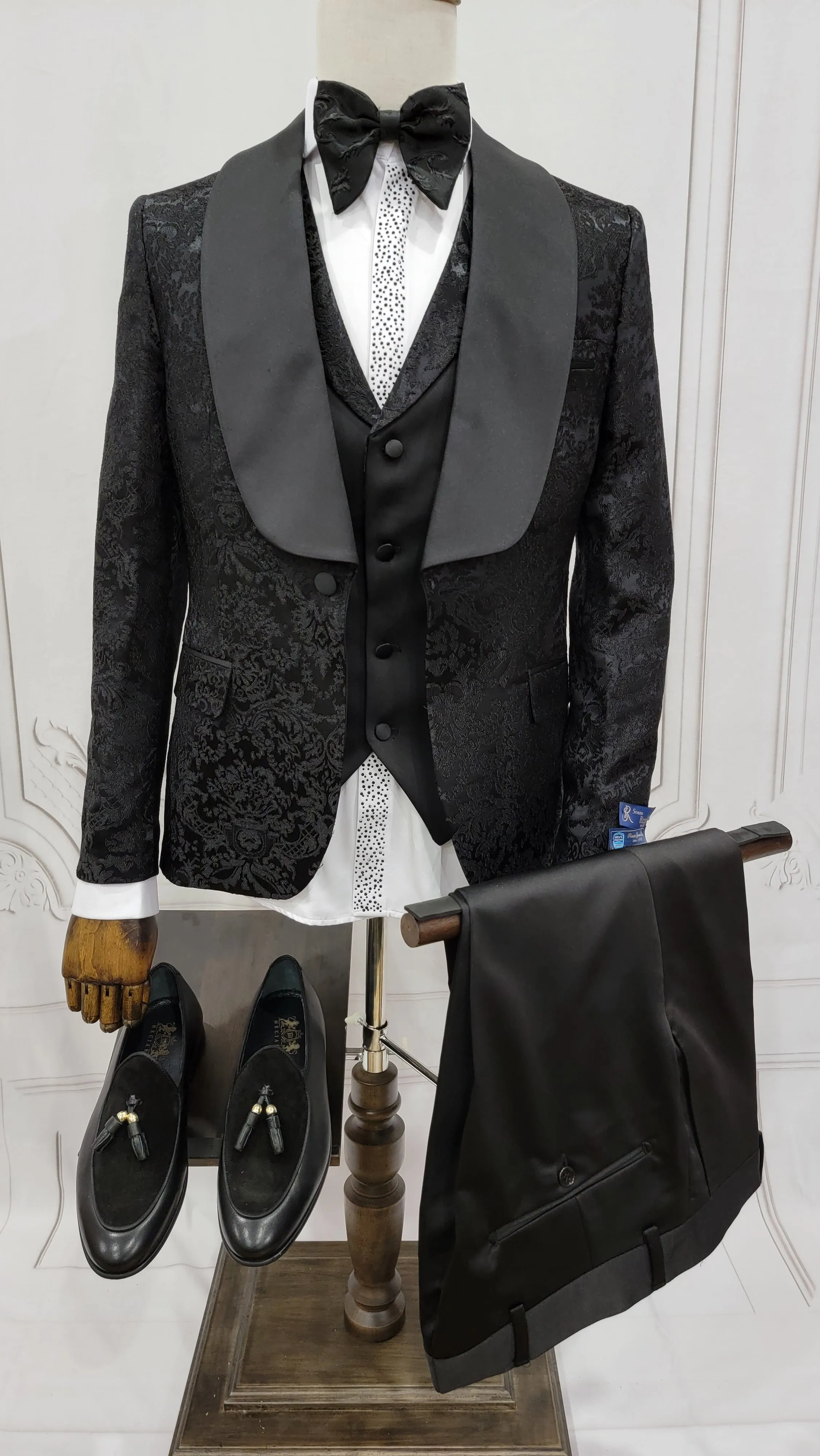 Three Piece Single button Tuxedo Suit with single breasted style vest.