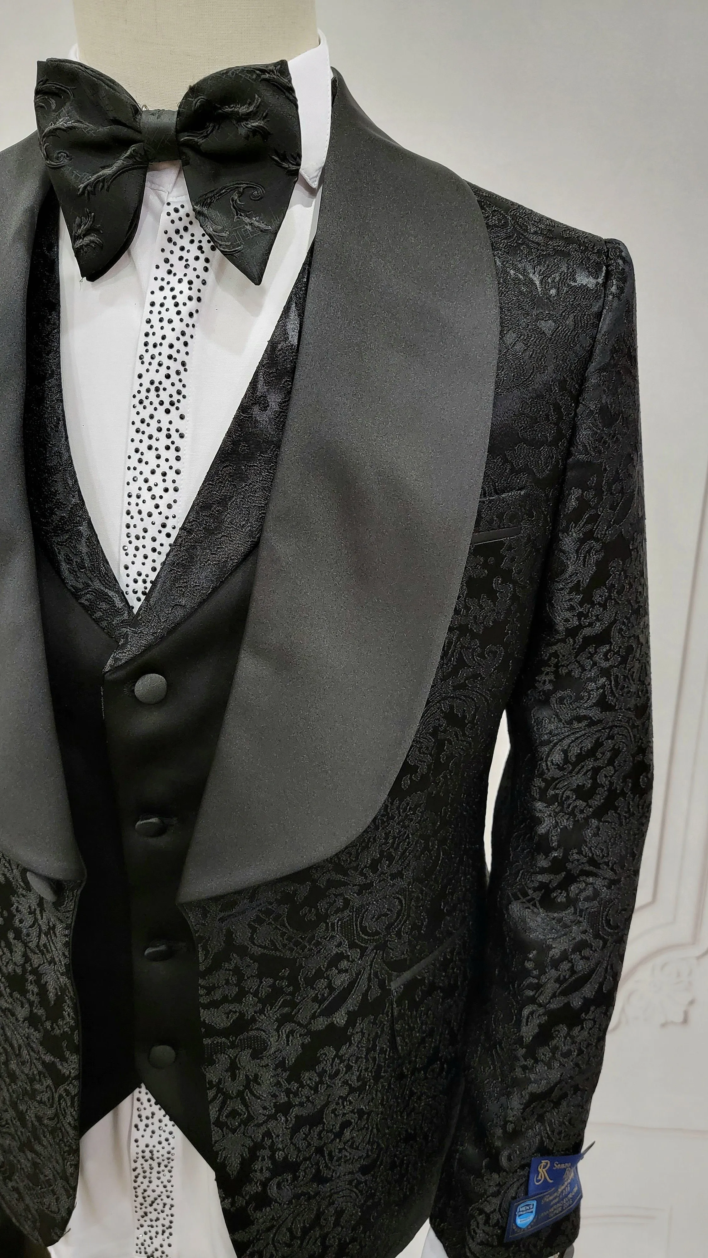 Three Piece Single button Tuxedo Suit with single breasted style vest.