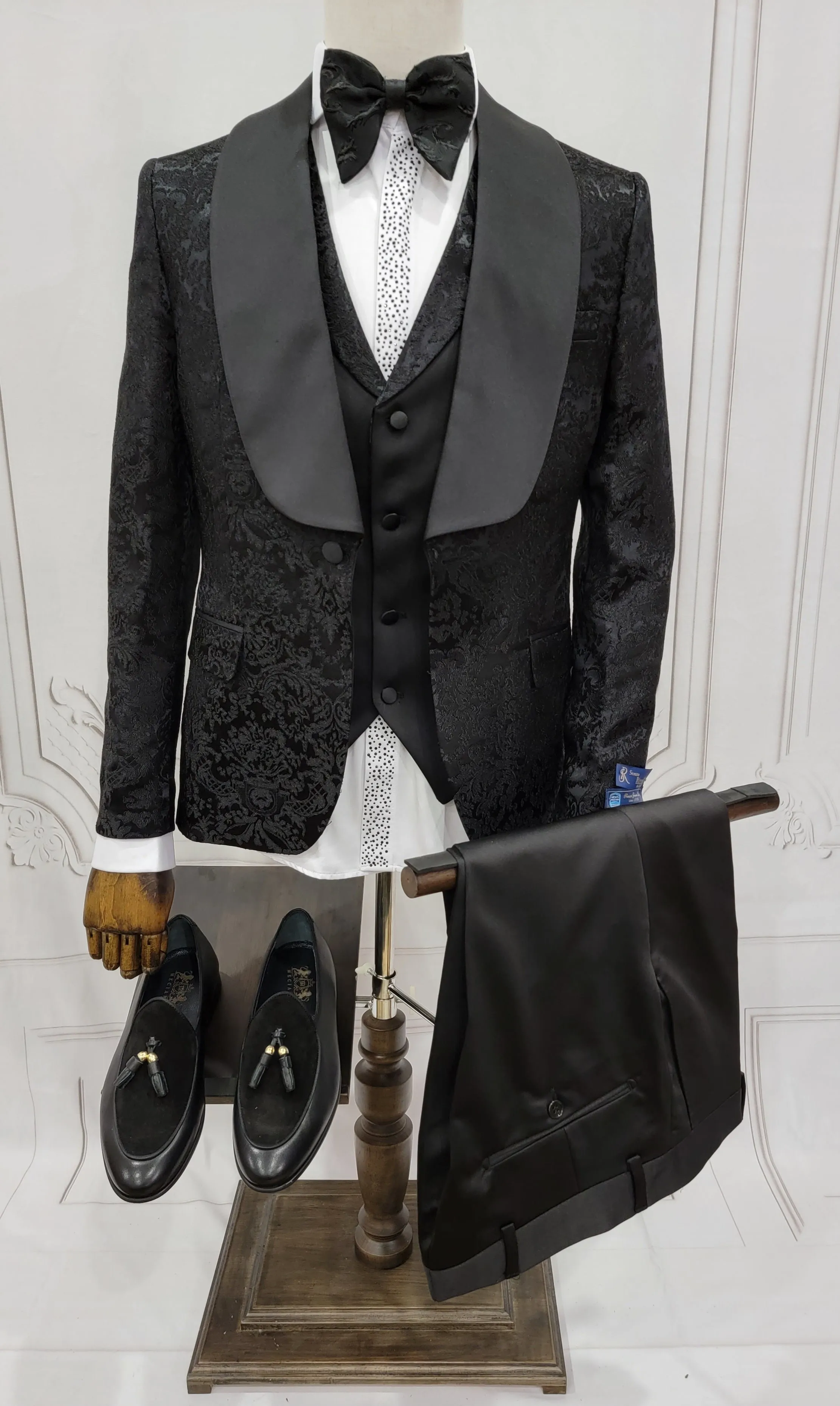 Three Piece Single button Tuxedo Suit with single breasted style vest.