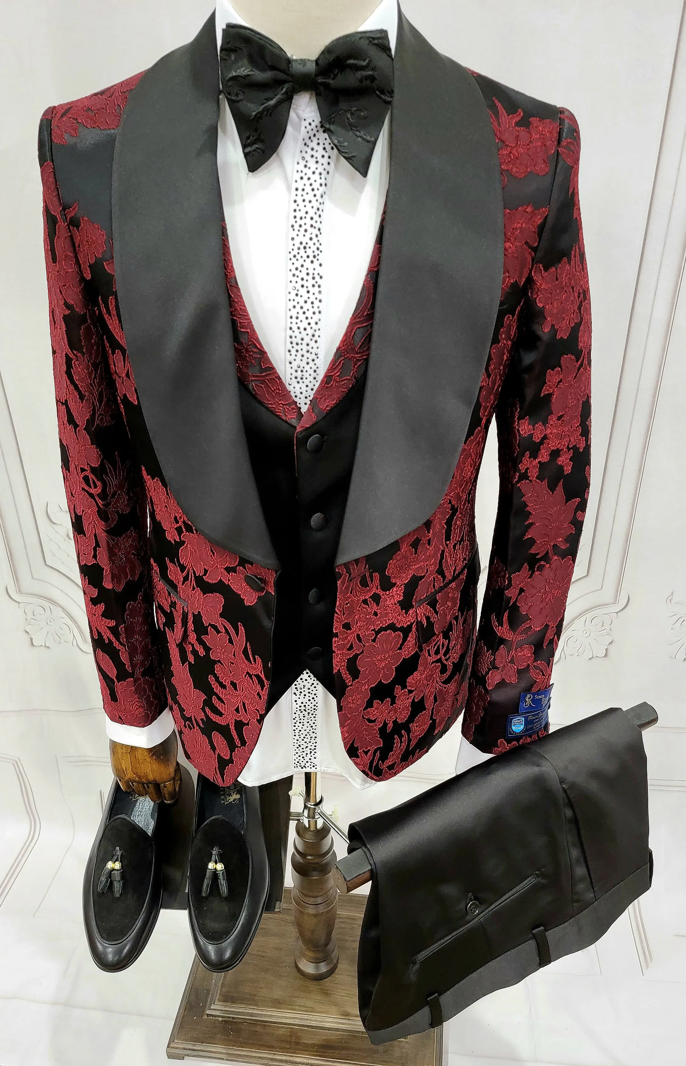 Three Pieces Tuxedo Suit with Black Satin Lapel, Contrasting black vest and black dress pants.