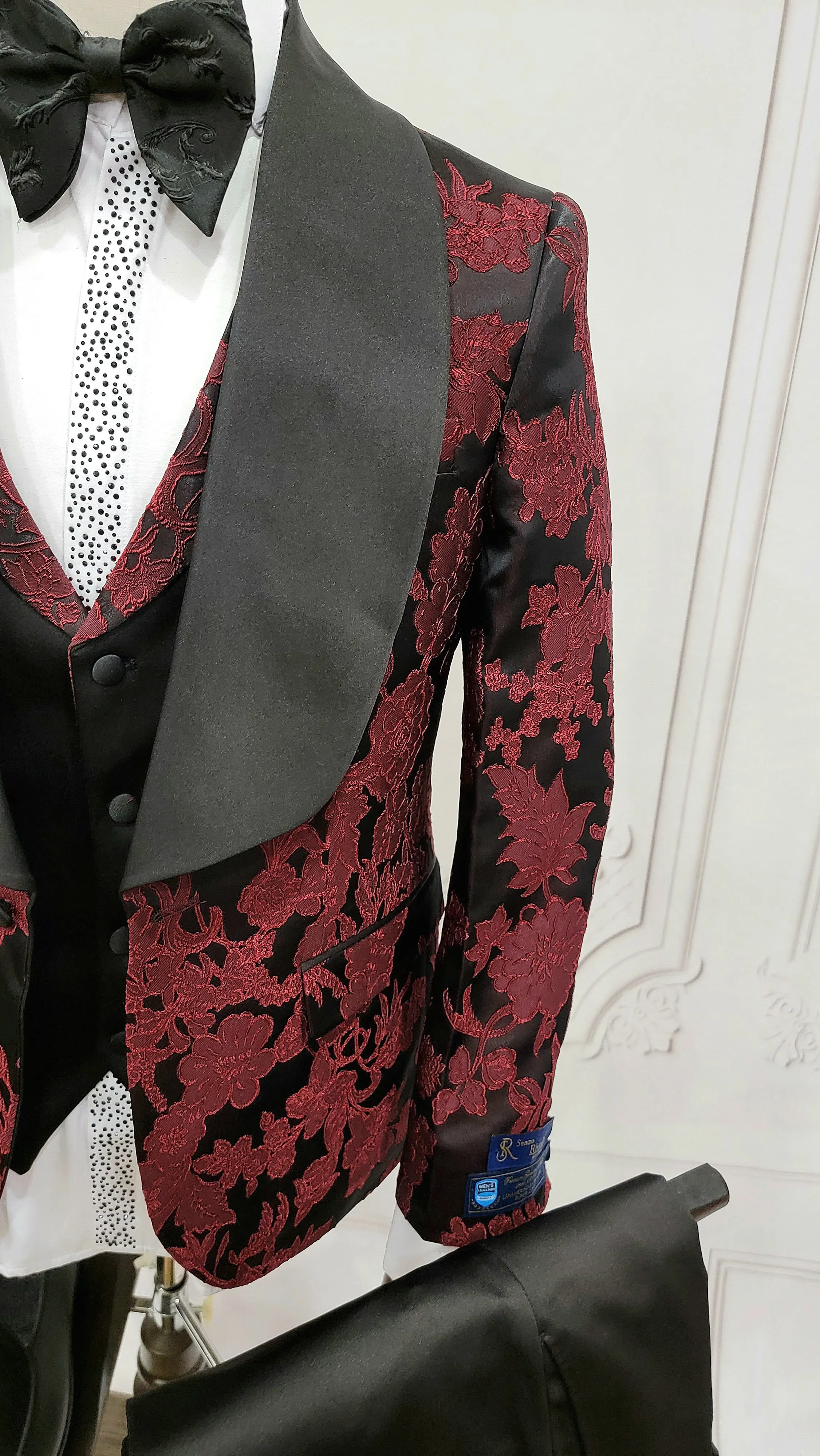 Three Pieces Tuxedo Suit with Black Satin Lapel, Contrasting black vest and black dress pants.