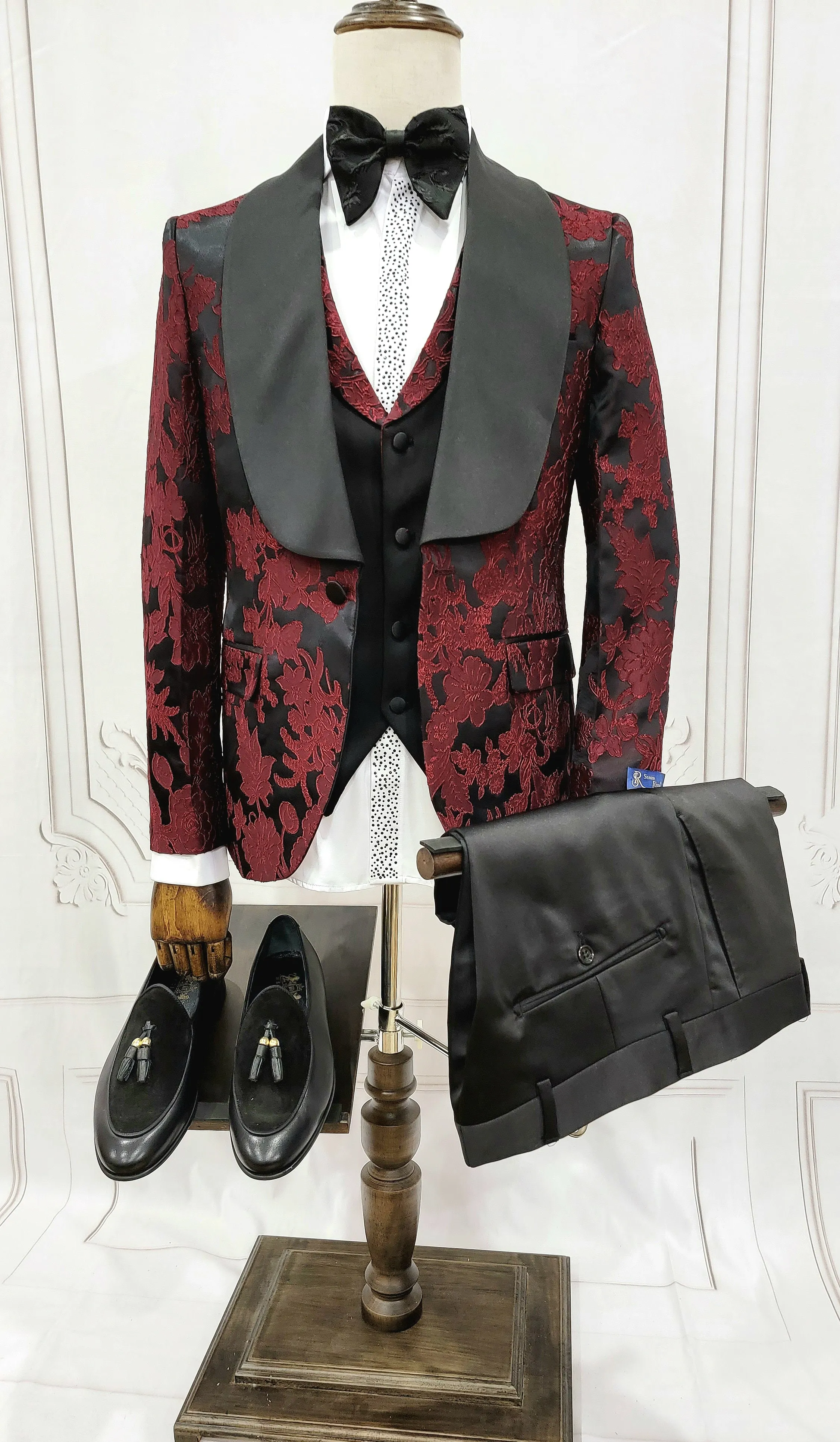 Three Pieces Tuxedo Suit with Black Satin Lapel, Contrasting black vest and black dress pants.