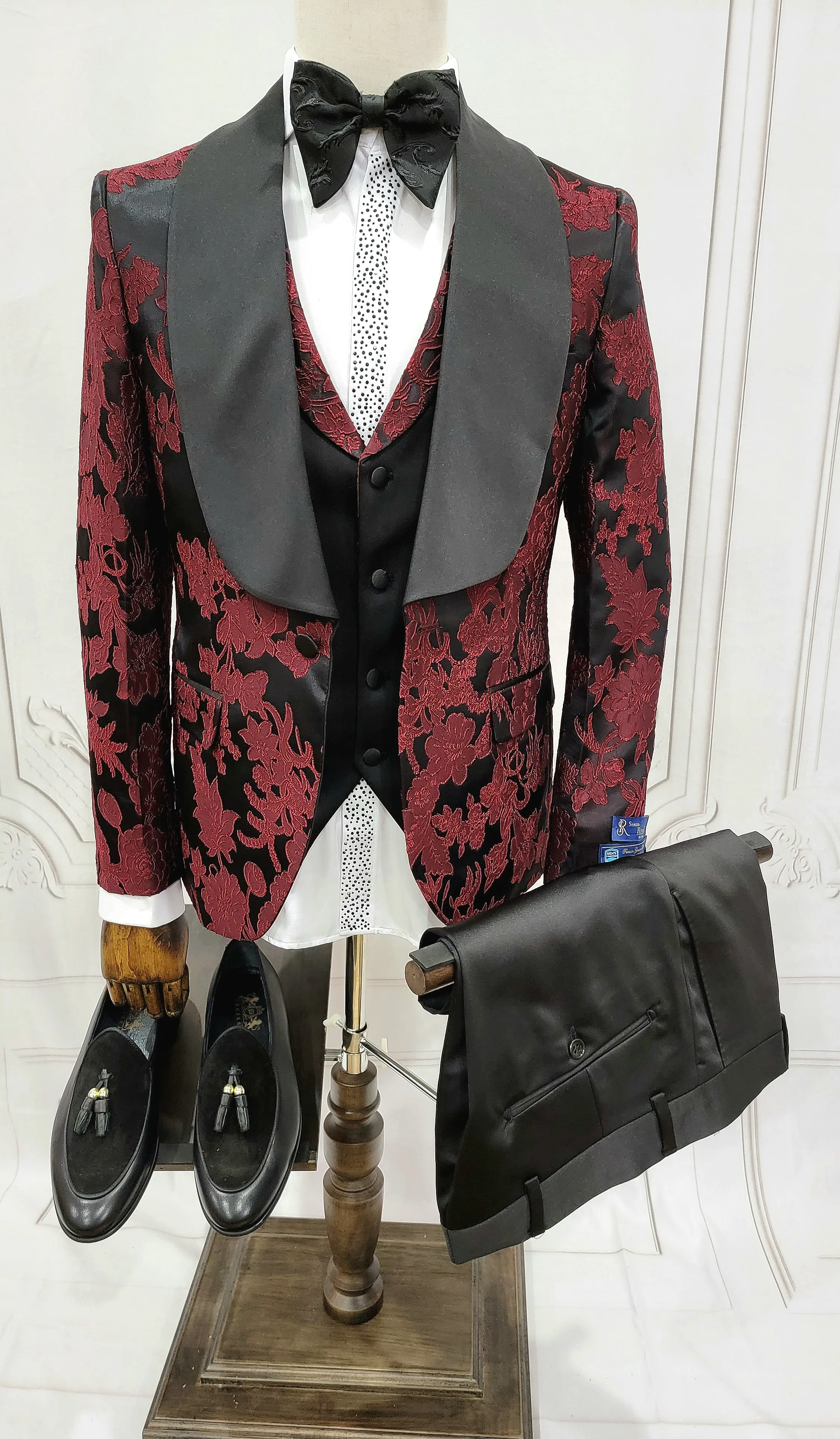 Three Pieces Tuxedo Suit with Black Satin Lapel, Contrasting black vest and black dress pants.