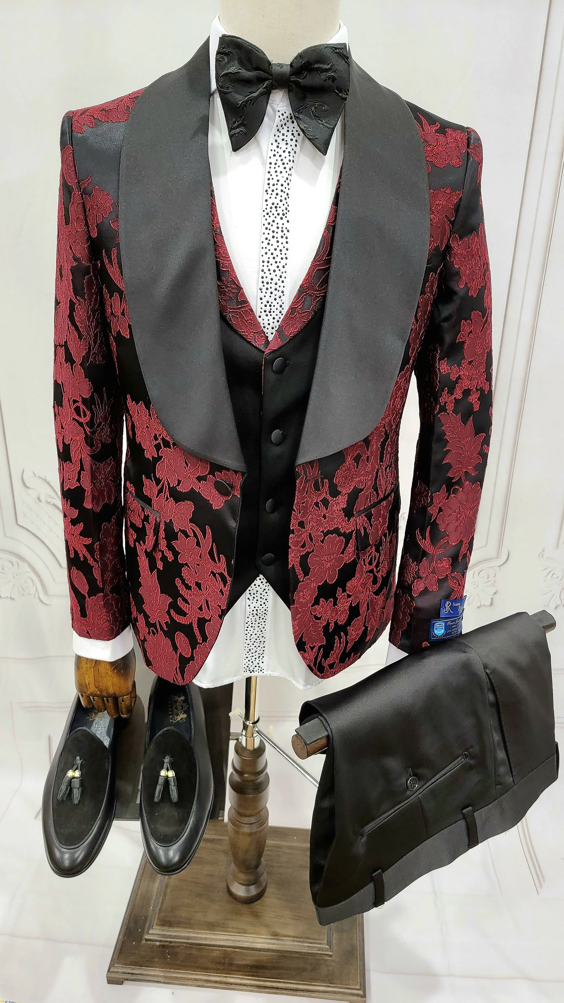 Three Pieces Tuxedo Suit with Black Satin Lapel, Contrasting black vest and black dress pants.